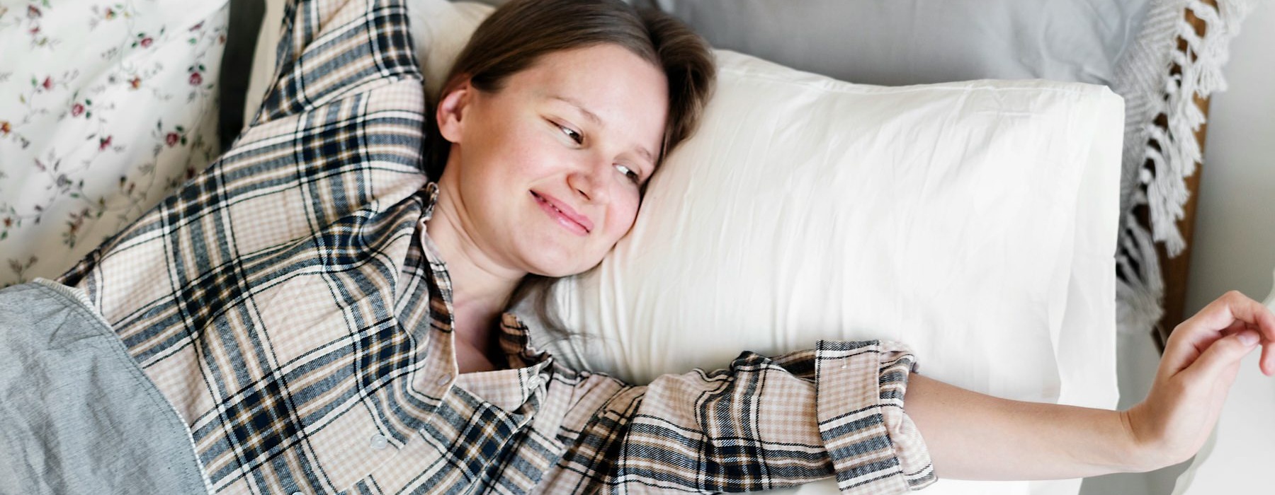 a person lying in a bed